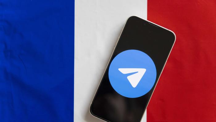 JAPAN - 2024/08/27: In this photo illustration, a Telegram logo seen displayed on a smartphone with the French flag in the background. Russian born Pavel Durov, CEO of the instant messaging app Telegram was arrested in France on August 26, 2024. (Photo Illustration by Stanislav Kogiku/SOPA Images/LightRocket via Getty Images)