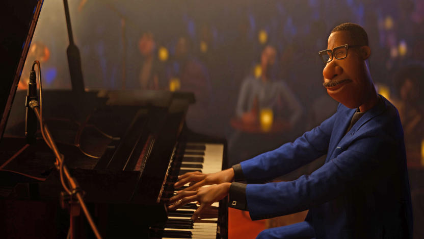 A man sits at a piano in a jazz club in Pixar's Soul.