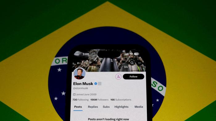 FILE PHOTO: The X account of Elon Musk in seen blocked on a mobile screen in this illustration after Brazil's telecommunications regulator suspended access to Elon Musk's X social network in the country to comply with an order from a judge who has been locked in a months-long feud with the billionaire investor, Sao Paulo, Brazil taken August 31, 2024. REUTERS/Jorge Silva/File Photo