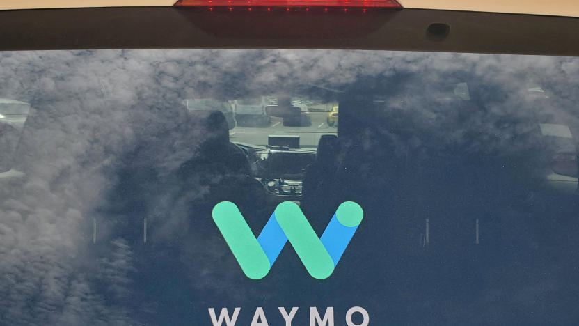 FILE PHOTO: The rear window of a Waymo Chrysler Pacifica robotaxi is seen while parked at a Target store in Tempe, Arizona, U.S., August 31, 2021. Picture taken August 31, 2021. REUTERS/Paresh Dave/File Photo