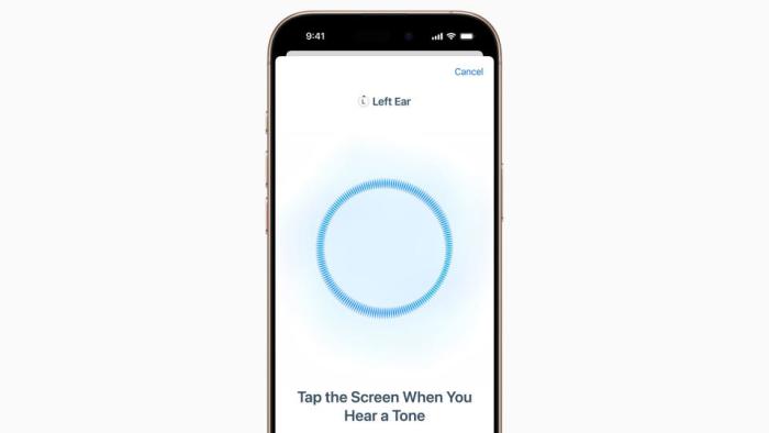 Image of an iPhone with the upcoming iOS 18 hearing test on its screen. It asks to tap the screen when you hear a tone.