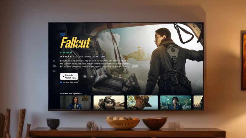 TV mounted on a wall, showing Amazon Prime TV's new layout. Screen shows details for Fallout.