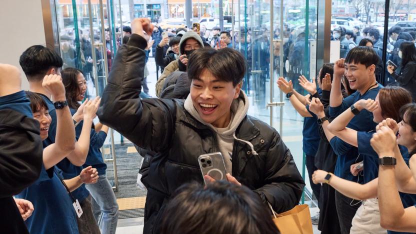 A happy customer at a South Korean Apple Store.