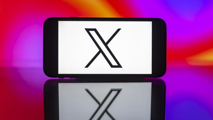 INDIA - 2024/03/12: In this photo illustration, the X formerly twitter logo is seen displayed on a mobile phone screen. (Photo Illustration by Idrees Abbas/SOPA Images/LightRocket via Getty Images)