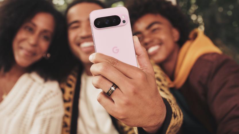 Happy people using a phone.