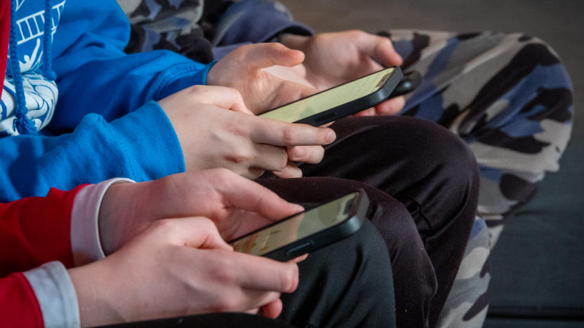 MORZINE, FRANCE - APRIL 08: Three teenage boys looks at their smartphone screens in village of St Jean d'Aulps on April 8, 2024 near Morzine, France.
Following the lead of the EU Commission and several US administrations, TikTok is set to be banned from UK government phones amid security concerns around the Chinese-owned video app. Recently TikTok announced that every account belonging to a user below age 18 have a 60-minute daily screen time limit automatically set. (Photo by Matt Cardy/Getty Images)